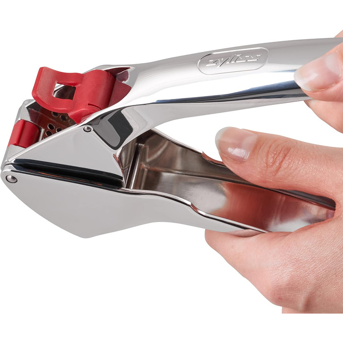 Практичний прес для великих зубчиків часнику, також з лушпинням. Включає інструмент для чищення (прес для часнику Easy Press, одинарний), 12150 Susi 3