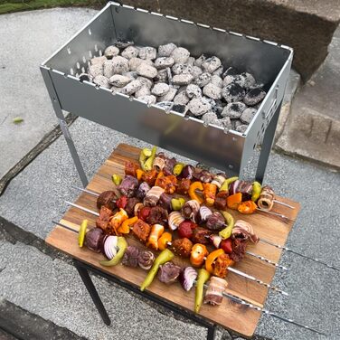 Портативний мангал включаючи 6 шампурів та решітку для гриля Grillpaul