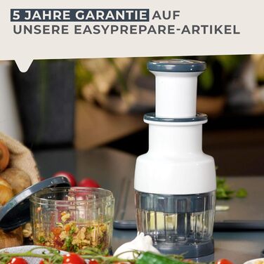 Измельчитель лука с прозрачным контейнером для сбора, надежной ручкой и нескользящими ножками Fackelmann