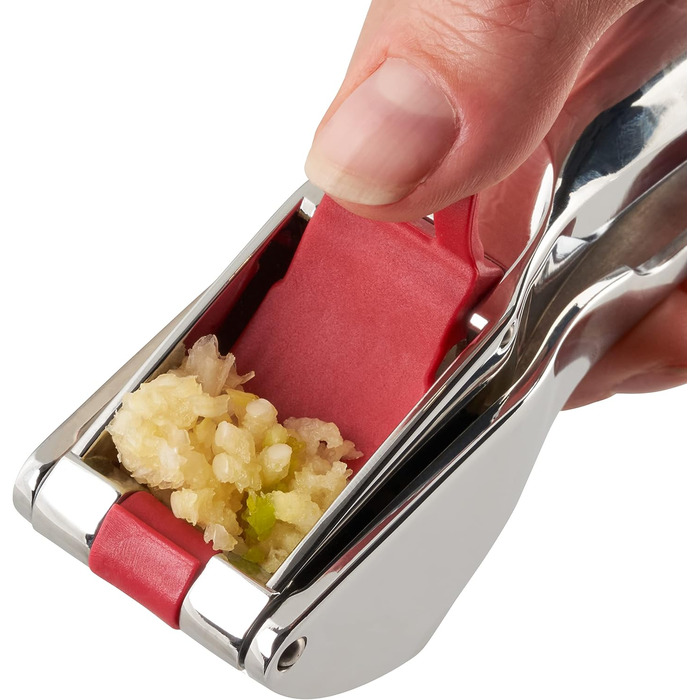 Практичний прес для великих зубчиків часнику, також з лушпинням. Включає інструмент для чищення (прес для часнику Easy Press, одинарний), 12150 Susi 3